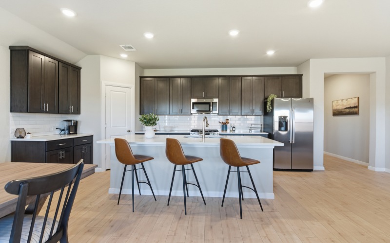 kitchen stainless steel appliances island dining