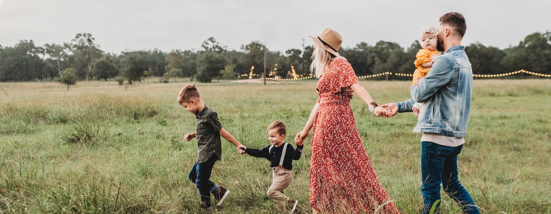 a family walking in a field